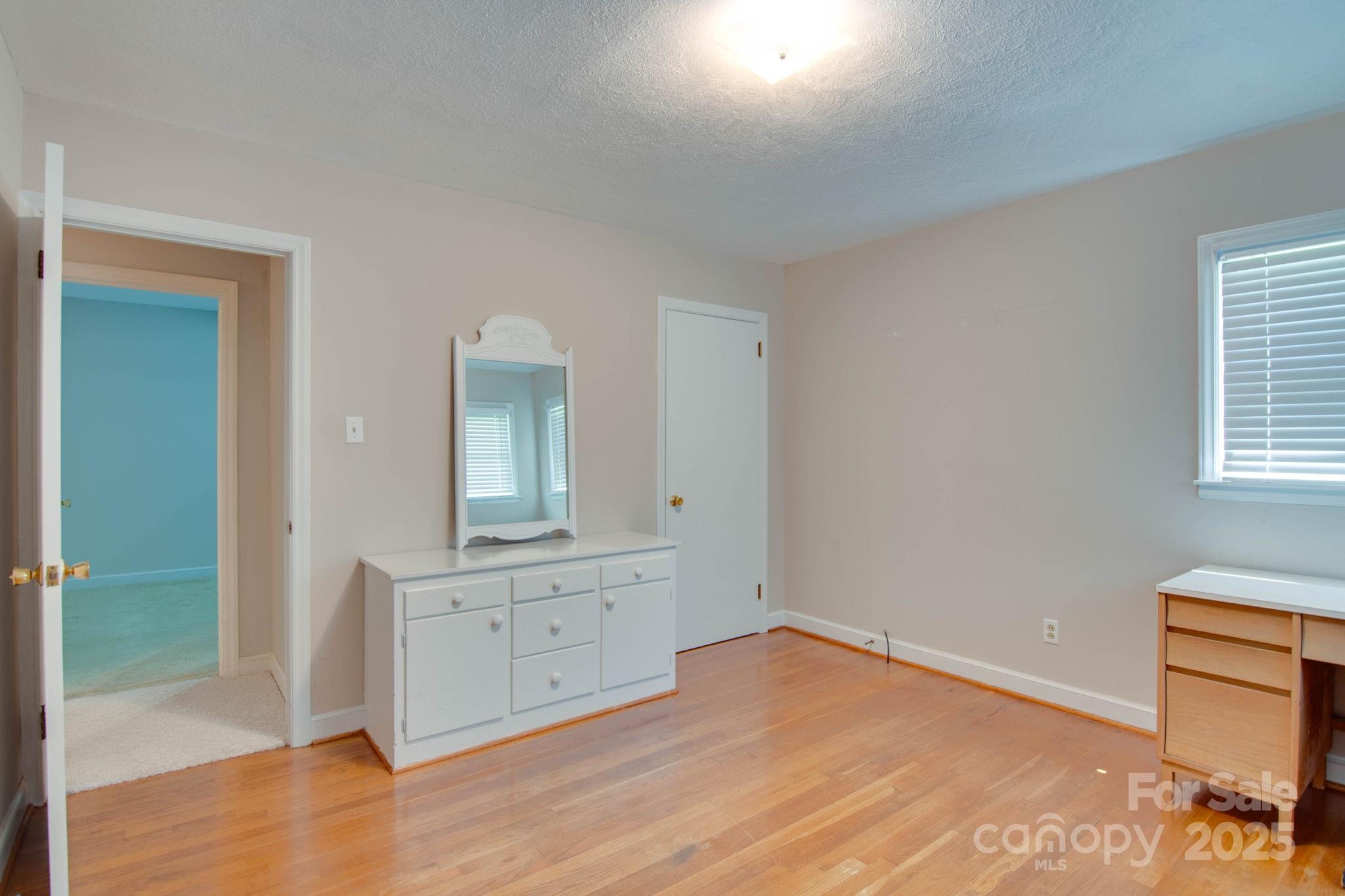 2319 Tin Mine Road Lincolnton, NC 28092 - Photo 23 of 30 an empty room with a bathroom and mirror