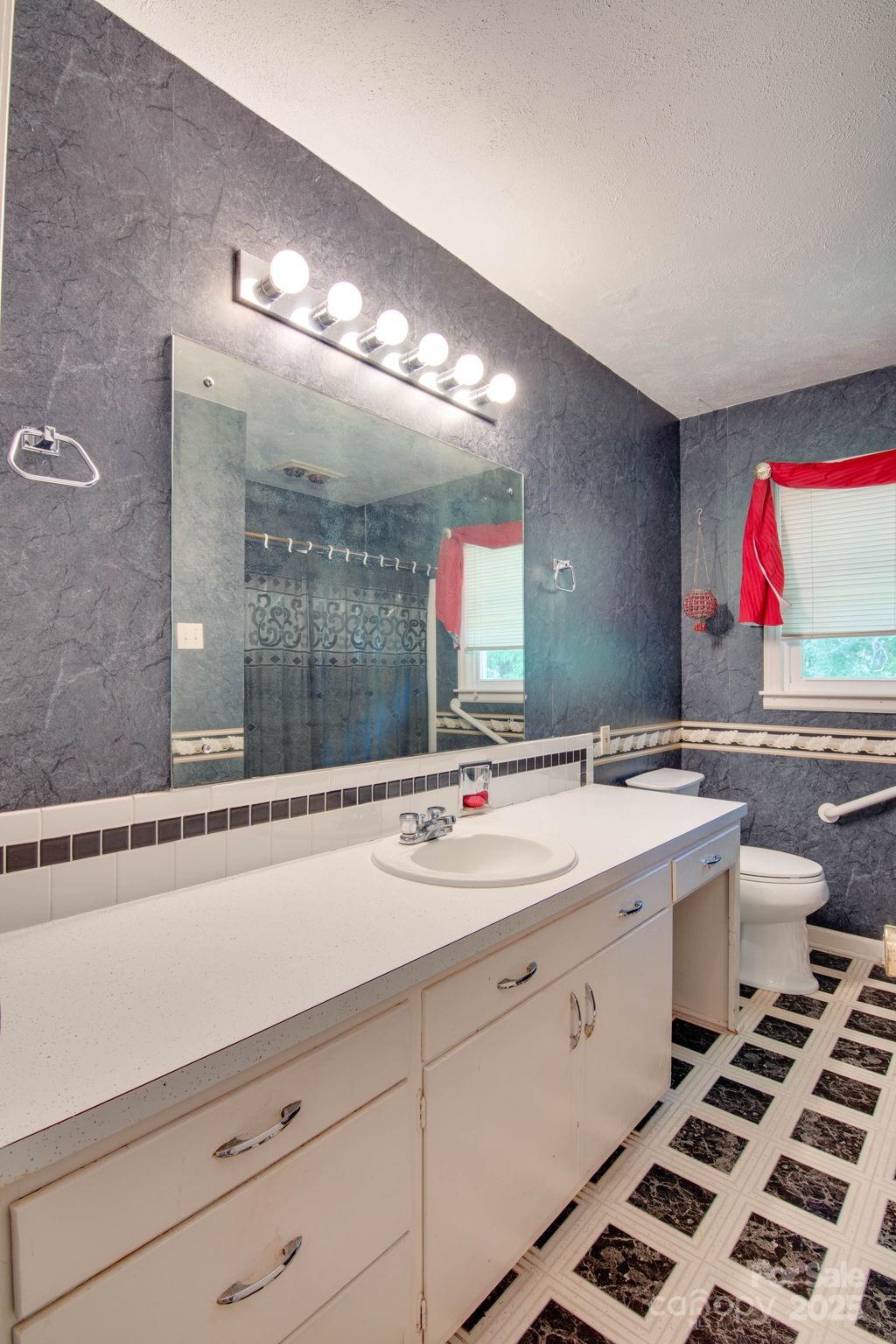 2319 Tin Mine Road Lincolnton, NC 28092 - Photo 27 of 30 a room with a sink and a mirror