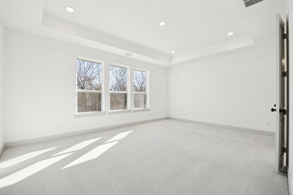 1400 Rose Mallow Road Celina, TX 75009 - Photo 10 of 21 Located at the rear of the home for additional privacy, this dreamy owner's suite was designed for rest and relaxation!