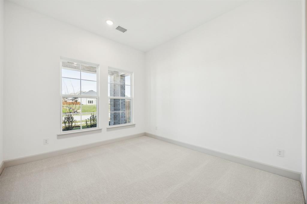 1400 Rose Mallow Road Celina, TX 75009 - Photo 17 of 21 You'll find nicely sized secondary bedrooms in our Versailles III plan.