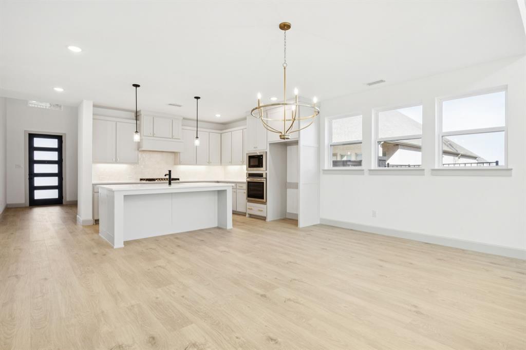 1400 Rose Mallow Road Celina, TX 75009 - Photo 6 of 21 Light, bright and spacious with ample prep and storage space, you're inner chef will love creating culinary masterpieces in this dream kitchen!