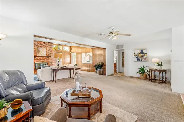 a view of a livingroom with furniture and a couch