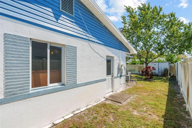 a view of a room with a large window