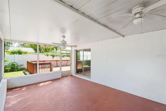 an aerial view of a residential houses with outdoor space