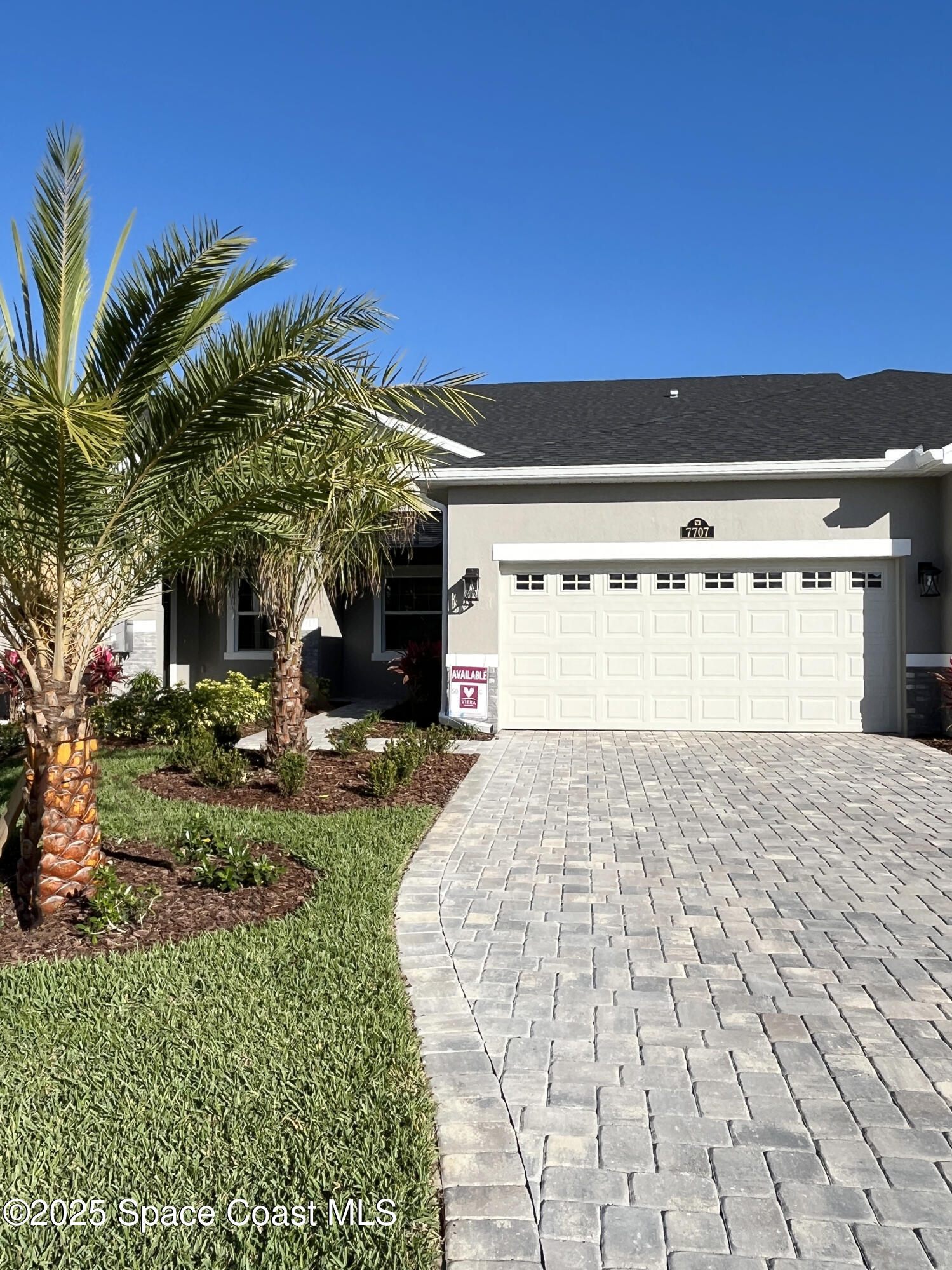 7707 Cache Crk Lane Melbourne, FL 32940 - Photo 1 of 18 a view of a backyard