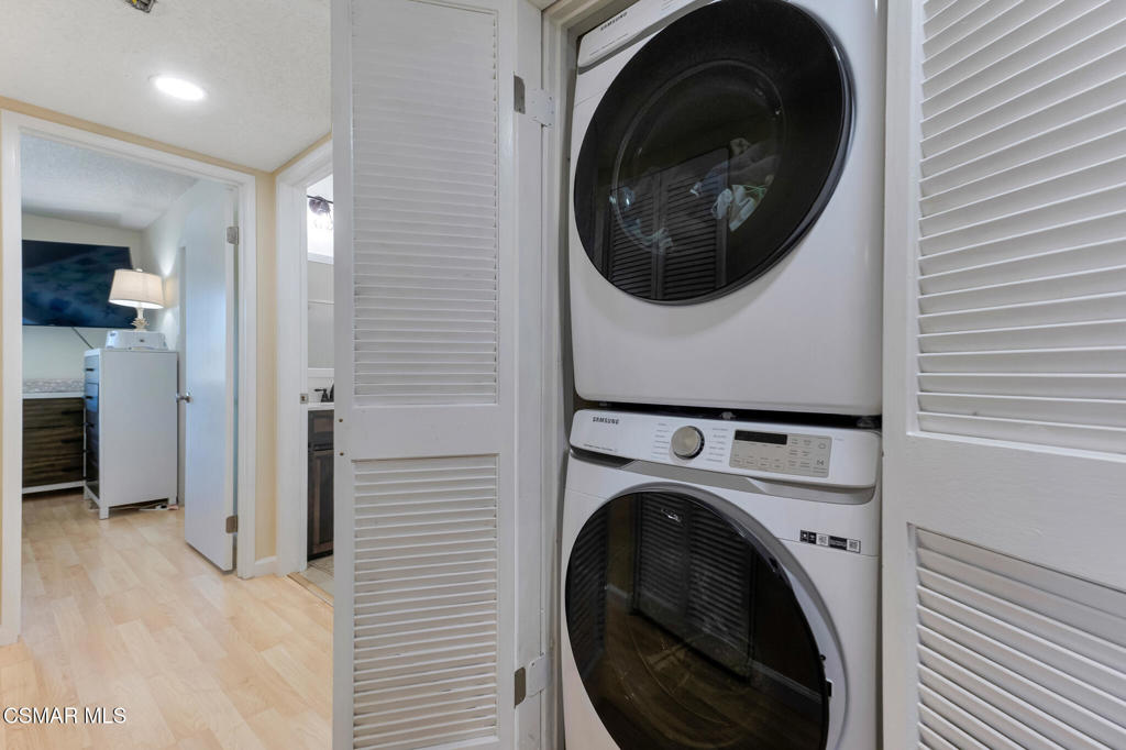 1932 Heywood Street, Unit B Simi Valley, CA 93065 - Photo 11 of 28 a view of a hallway with washer and dryer