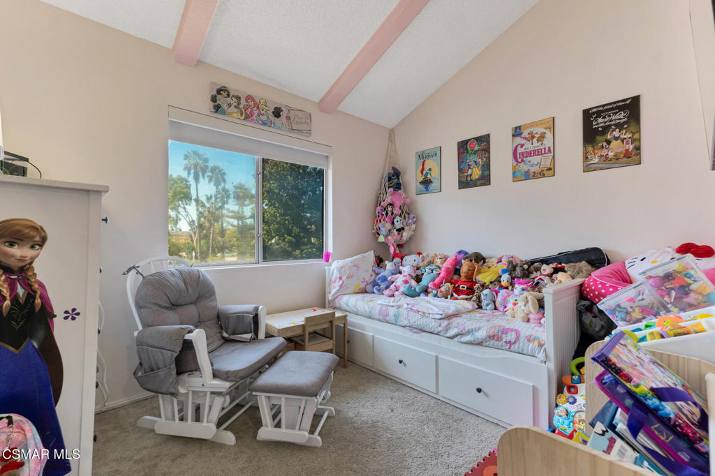 1932 Heywood Street, Unit B Simi Valley, CA 93065 - Photo 12 of 28 a living room with baby toys and furniture