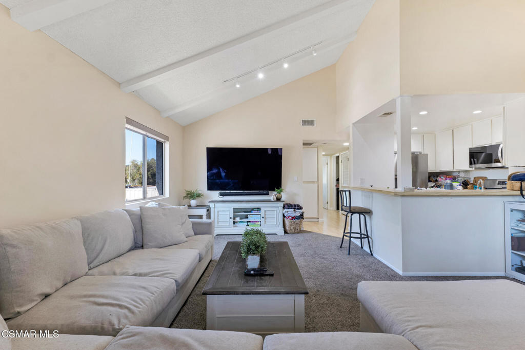 1932 Heywood Street, Unit B Simi Valley, CA 93065 - Photo 3 of 28 a living room with furniture and a flat screen tv