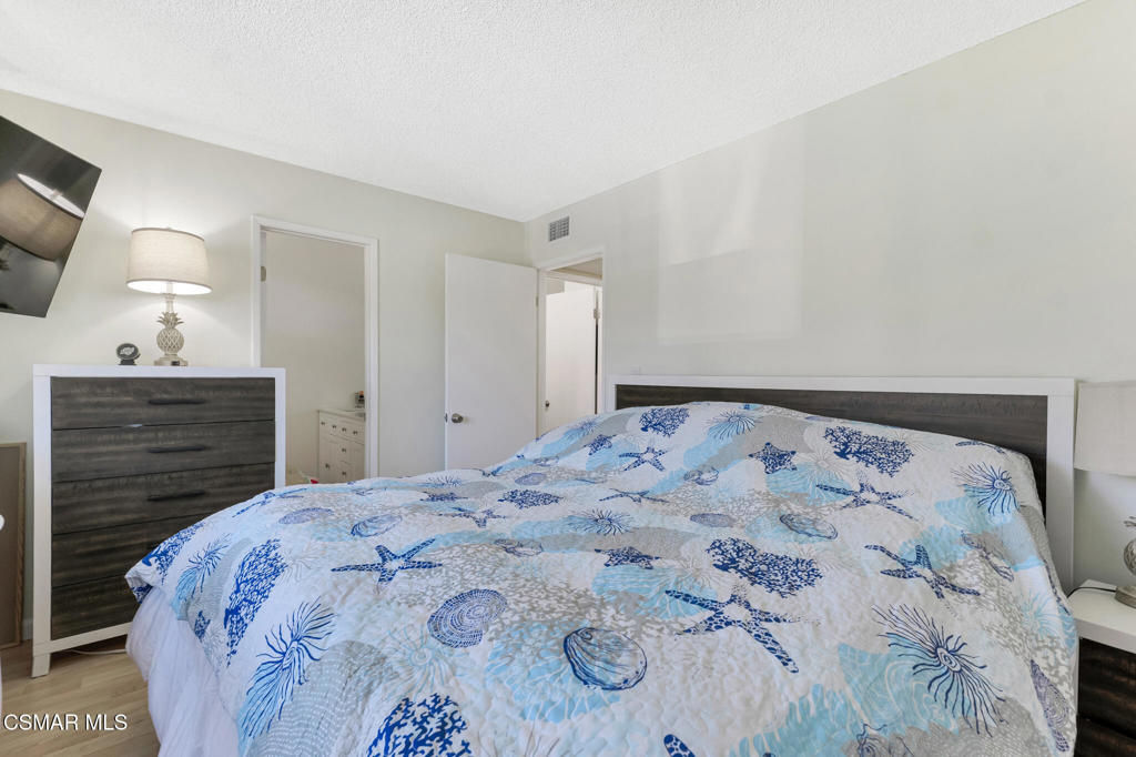 1932 Heywood Street, Unit B Simi Valley, CA 93065 - Photo 7 of 28 a bedroom with a bed and a dresser