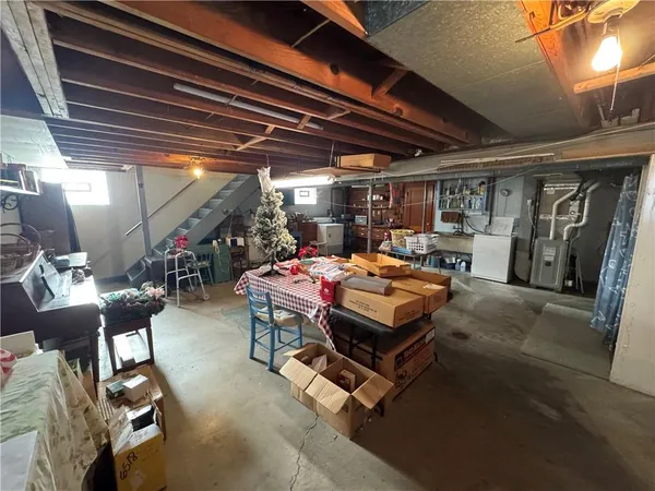 a living room with lots of furniture and a table