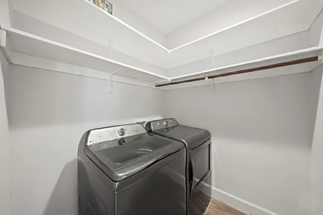 a utility room with dryer and washer