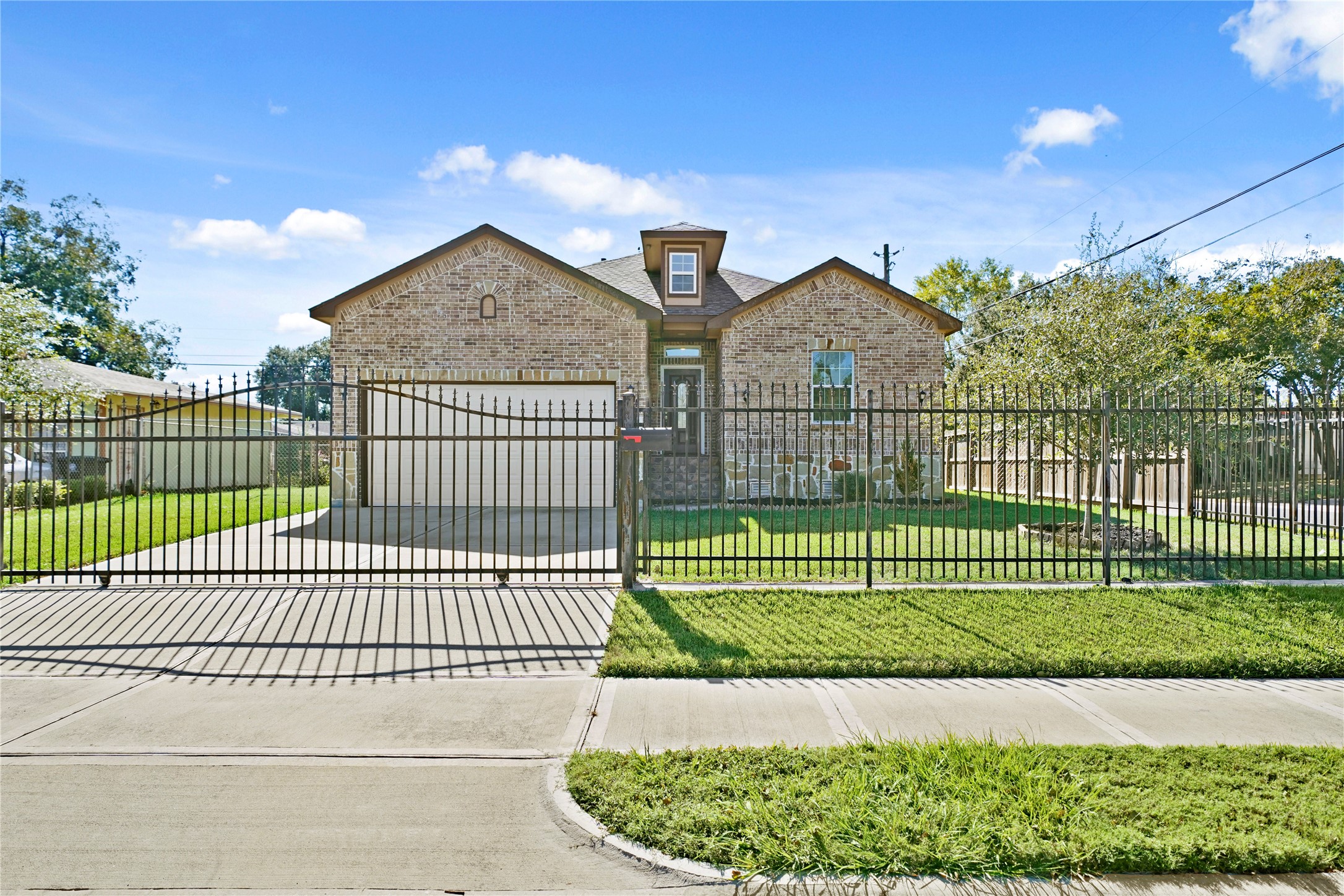 5602 Belmark Street Houston, TX 77033 - Photo 27 of 27 a view of a house with a small yard and plants