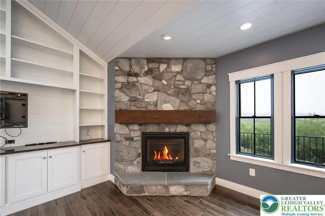a view of a livingroom with wooden floor