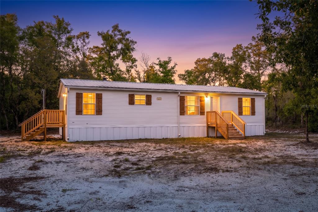 9591 Northeast 87 Place Bronson, FL 32621 - Photo 1 of 92 Gallery Image 1