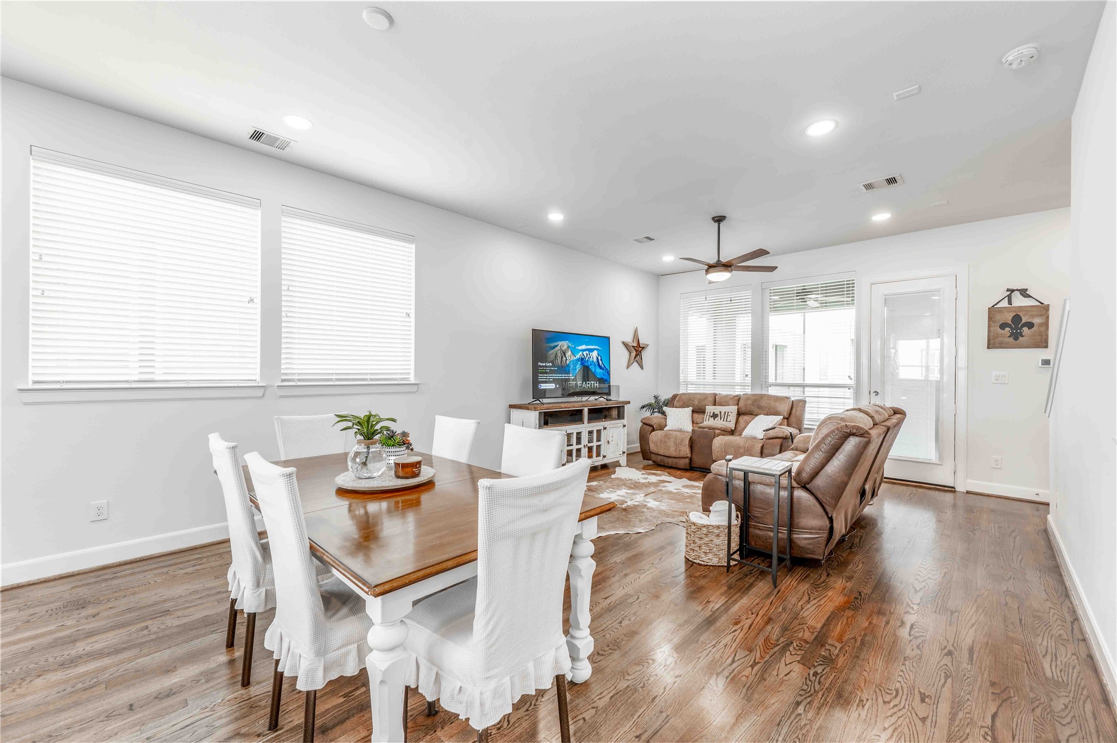 1038 Timbergrove Yards Lane Houston, TX 77008 - Photo 12 of 43 a living room with furniture a large window and wooden floor