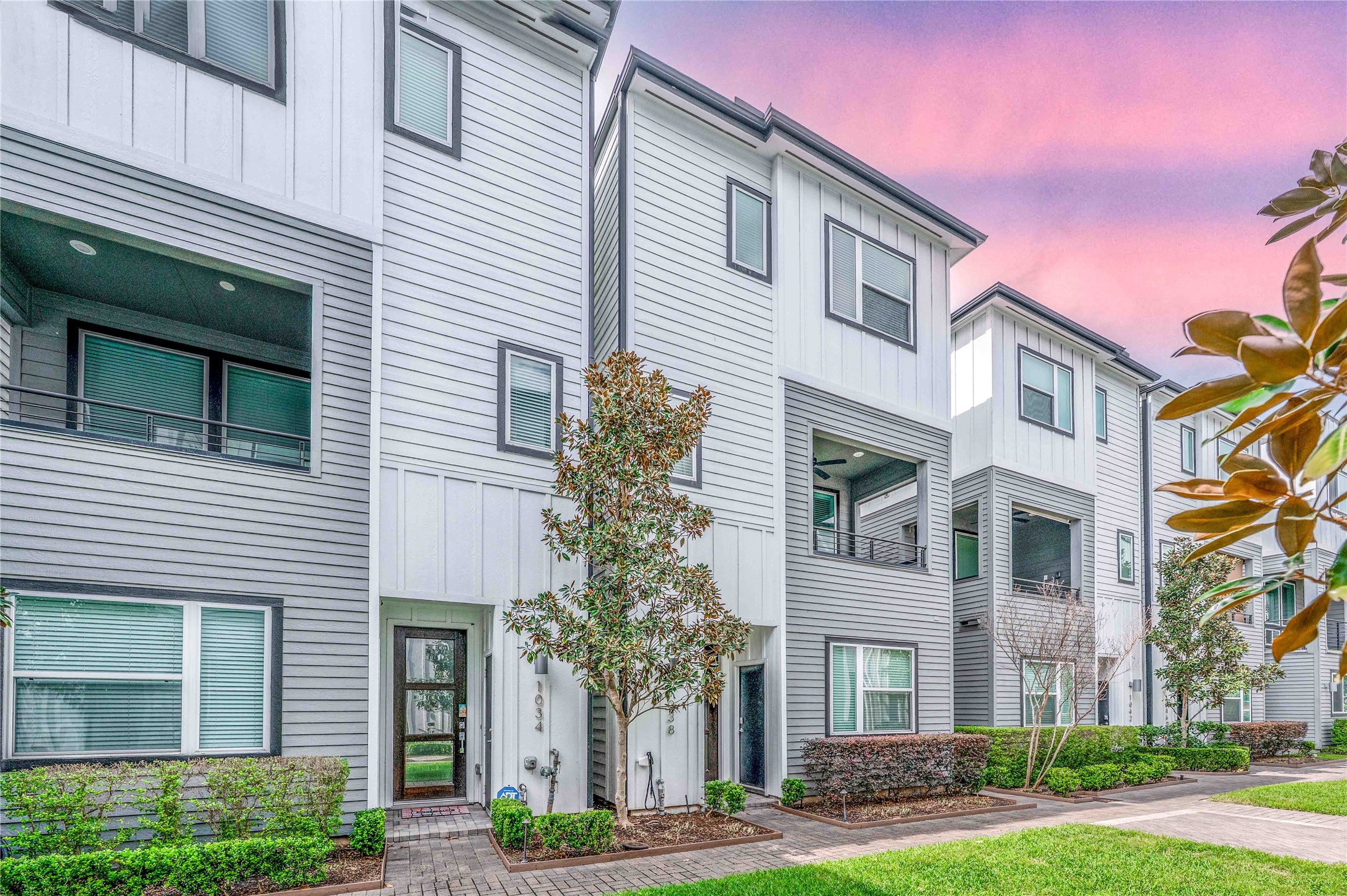 1038 Timbergrove Yards Lane Houston, TX 77008 - Photo 24 of 43 a front view of a residential houses with yard and green space
