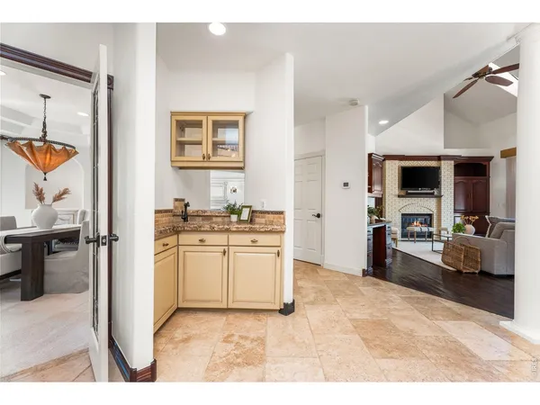 a kitchen with stainless steel appliances granite countertop a stove and a refrigerator