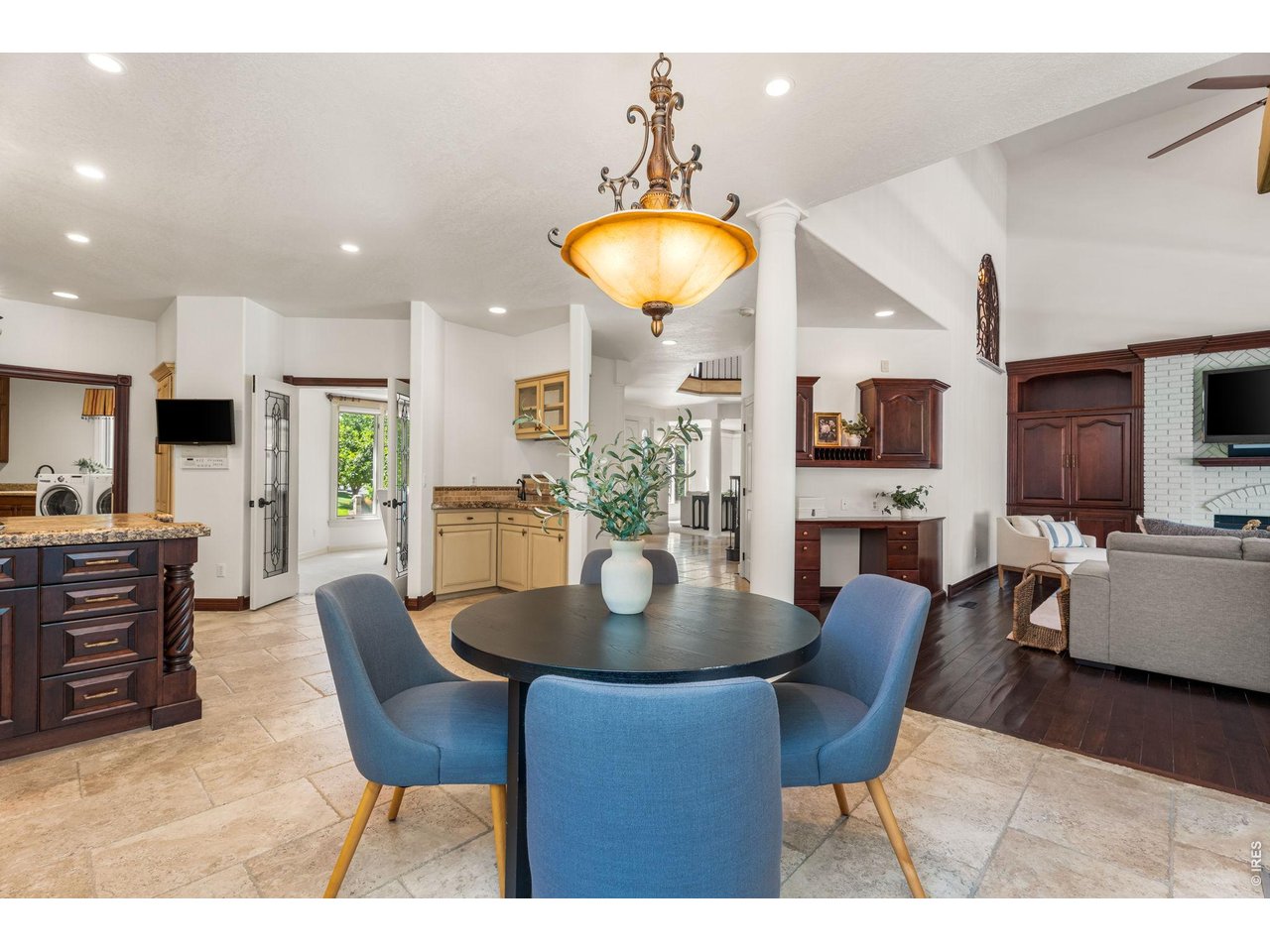 5100 Abbey Road Fort Collins, CO 80526 - Photo 15 of 49 a view of a dining room with furniture and wooden floor
