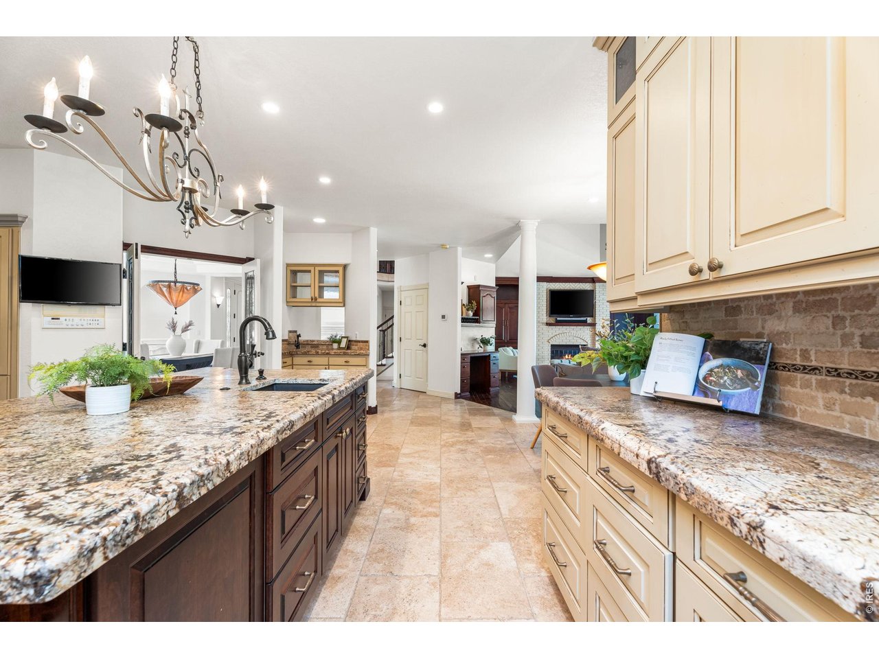 5100 Abbey Road Fort Collins, CO 80526 - Photo 17 of 49 a kitchen with stainless steel appliances granite countertop a sink stove and cabinets