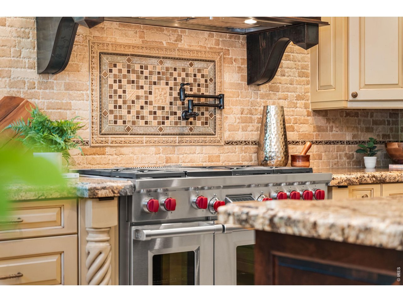 5100 Abbey Road Fort Collins, CO 80526 - Photo 18 of 49 a kitchen with a sink stove and cabinets