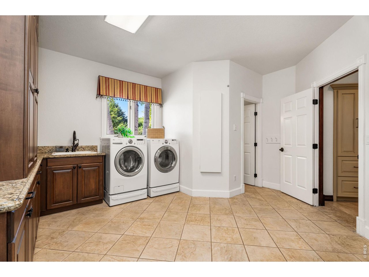 5100 Abbey Road Fort Collins, CO 80526 - Photo 21 of 49 a utility room with dryer and washer