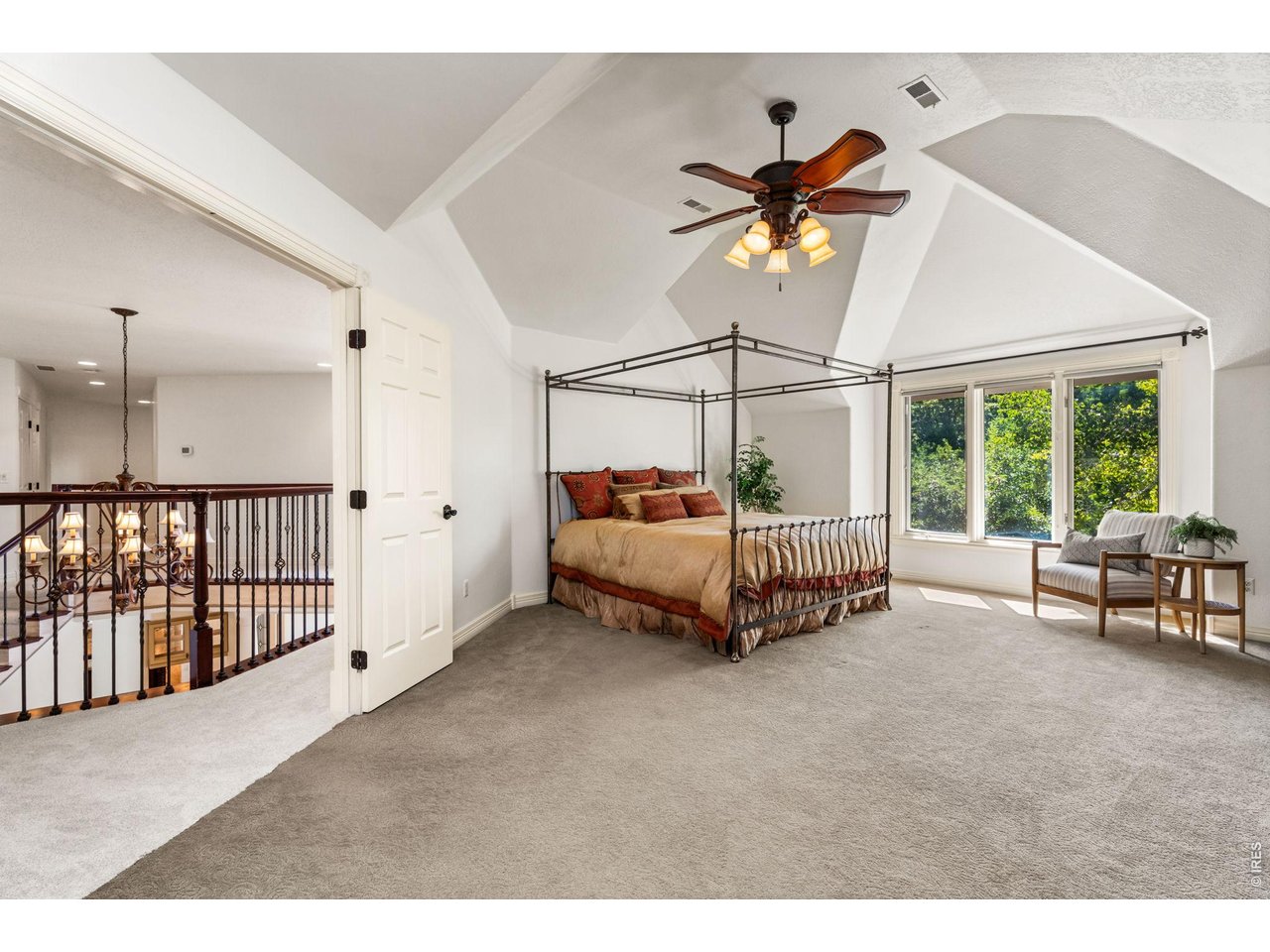 5100 Abbey Road Fort Collins, CO 80526 - Photo 24 of 49 a bedroom with furniture and a window