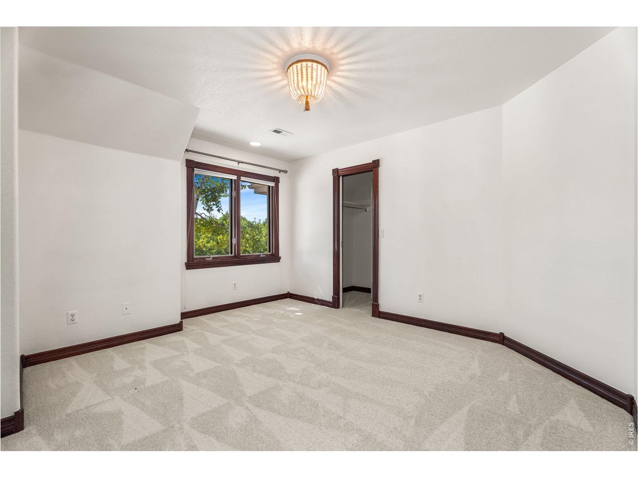 5100 Abbey Road Fort Collins, CO 80526 - Photo 30 of 49 a view of an empty room with windows