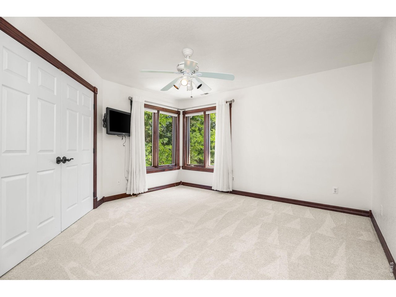 5100 Abbey Road Fort Collins, CO 80526 - Photo 31 of 49 a view of an empty room with a window
