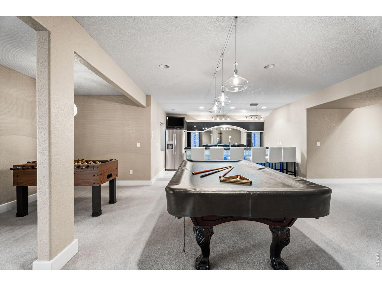 5100 Abbey Road Fort Collins, CO 80526 - Photo 38 of 49 a view of a dining room with furniture and chandelier