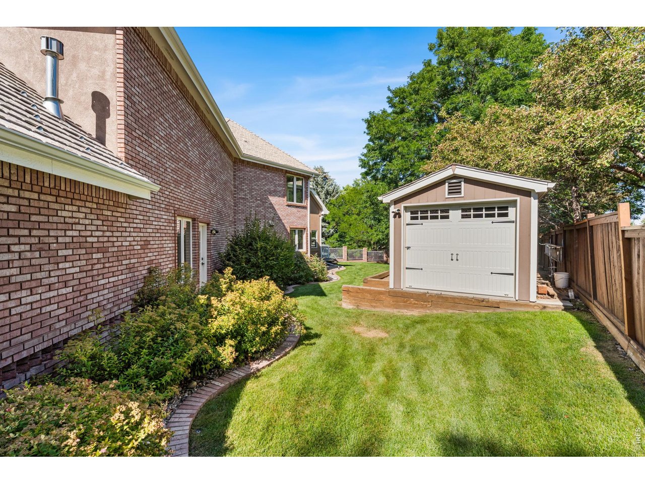 5100 Abbey Road Fort Collins, CO 80526 - Photo 47 of 49 a view of a back yard with an outdoor space