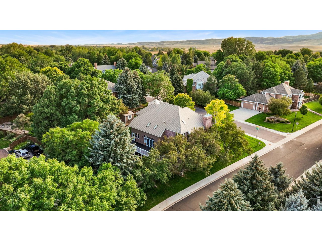 5100 Abbey Road Fort Collins, CO 80526 - Photo 49 of 49 a view of a garden with a building in the background