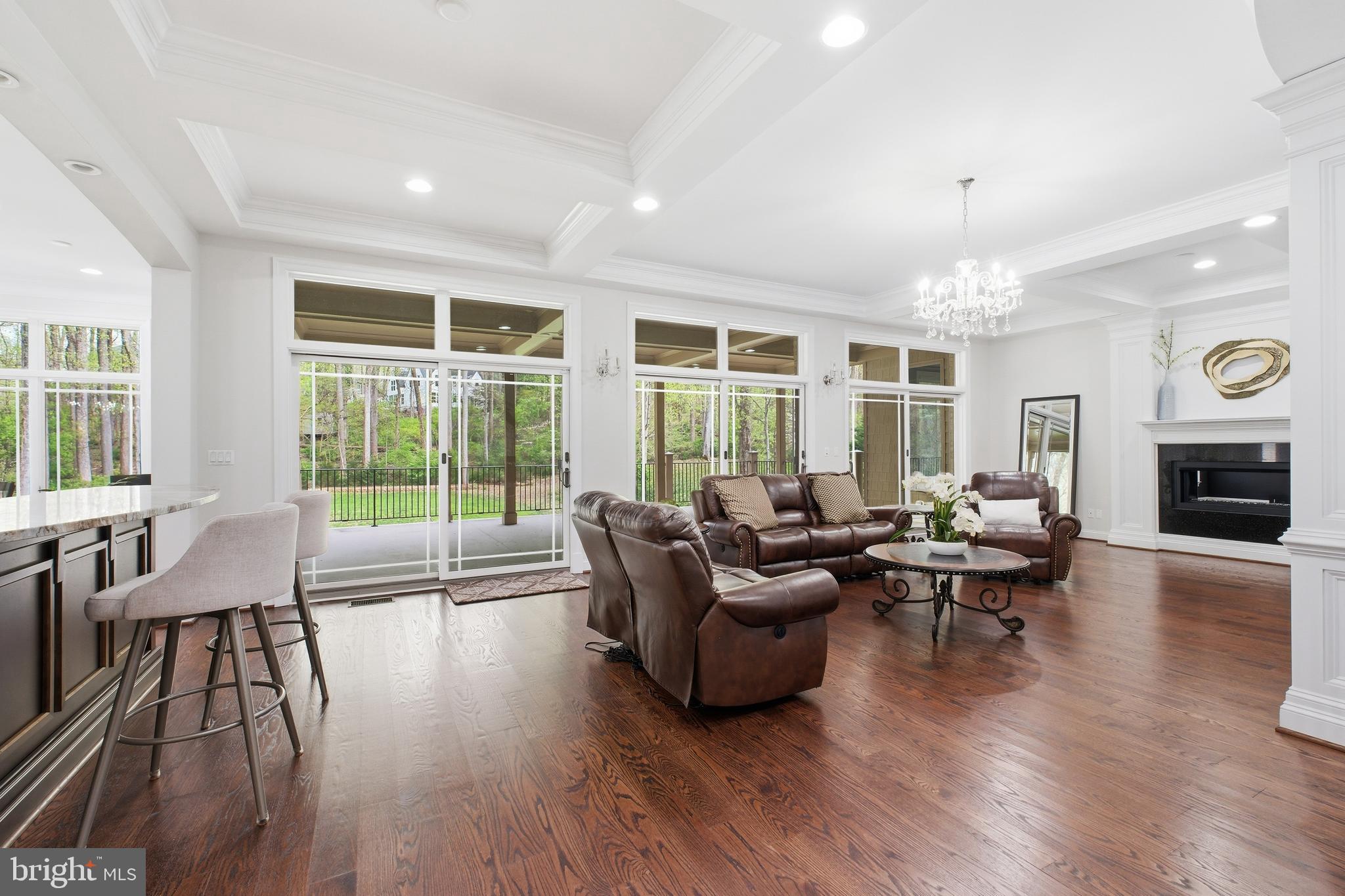 8735 Brook Road McLean, VA 22102 - Photo 3 of 20 a living room with fireplace furniture and a large window