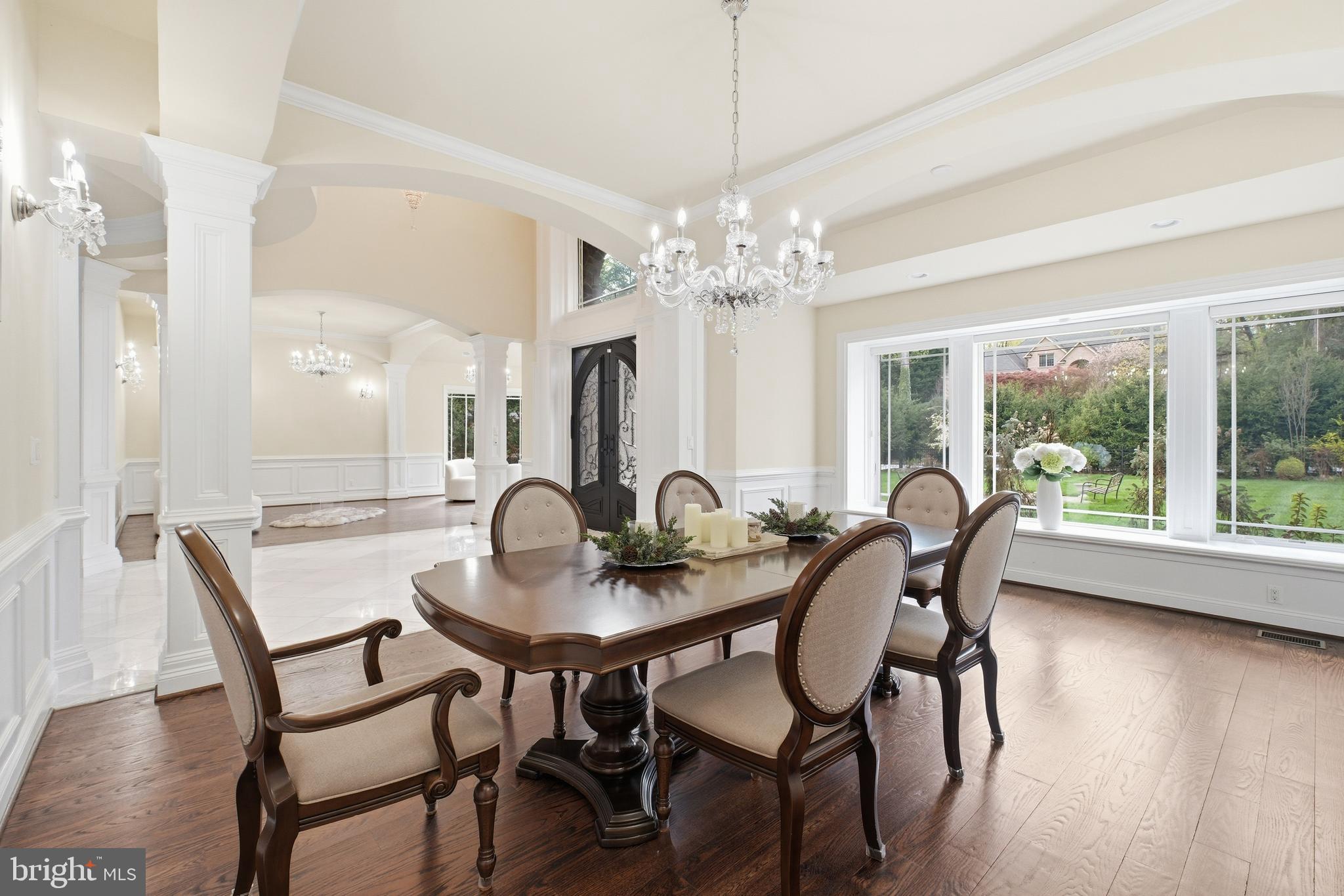 8735 Brook Road McLean, VA 22102 - Photo 7 of 20 a view of a dining room with furniture window and wooden floor