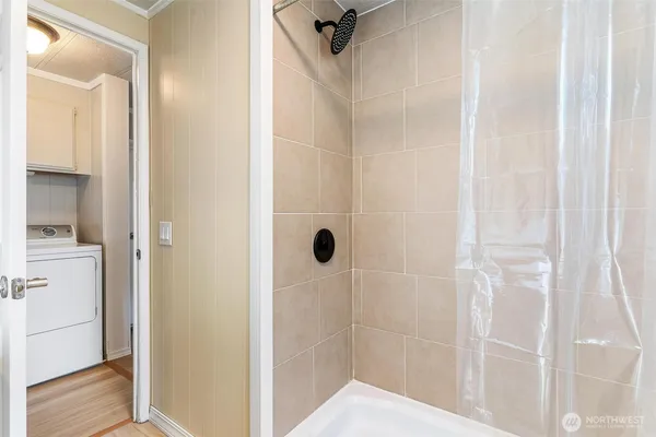 a view of a bathroom from a hallway