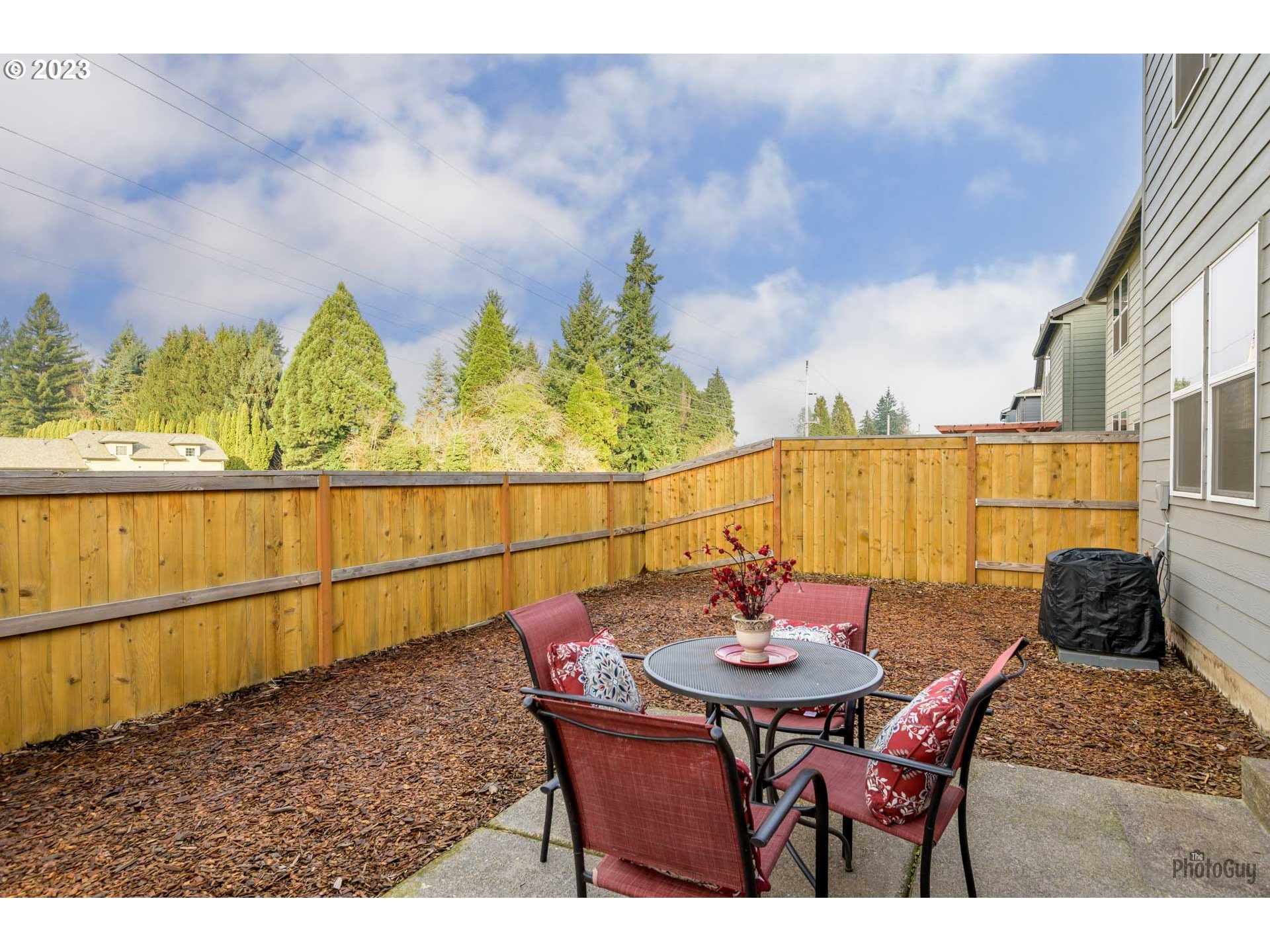 2942 W Street Springfield, OR 97477 - Photo 22 of 29 a view of a table and chairs in the patio