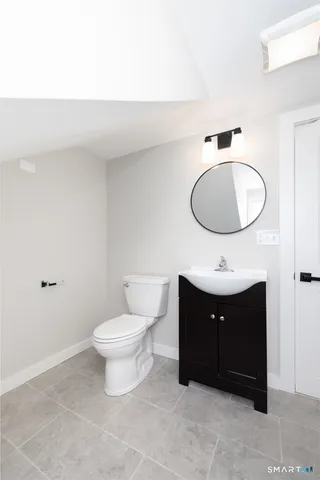 a bathroom with a sink and a toilet