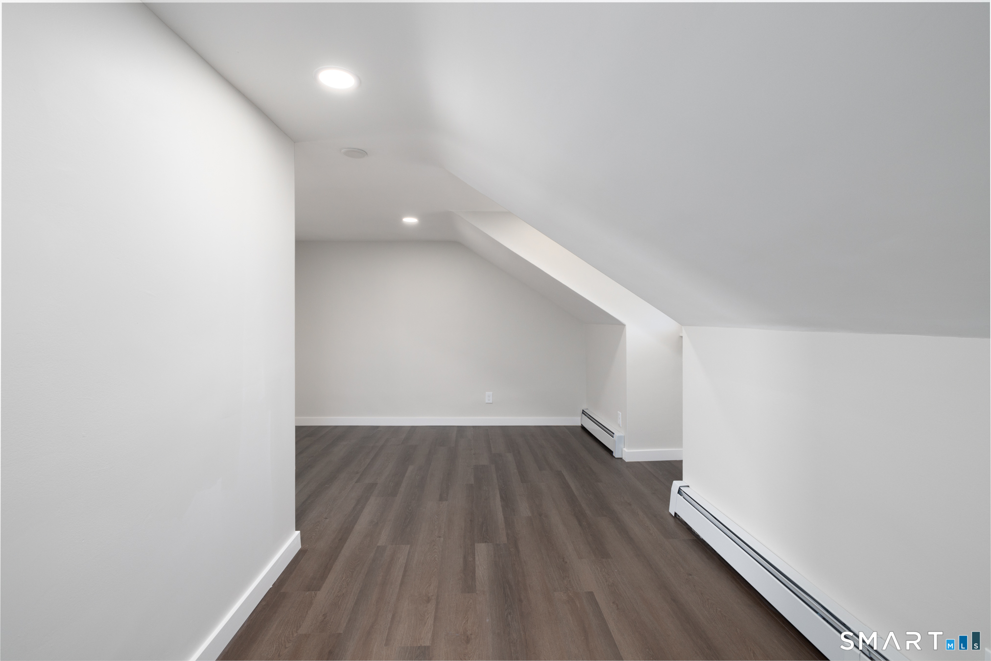 28 Aircraft Road, Unit J Southington, CT 06489 - Photo 14 of 18 a view of a hallway with wooden floor