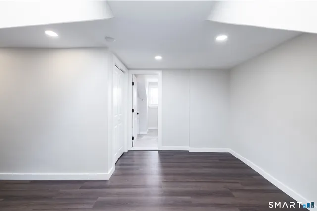 a view of room with hardwood floor