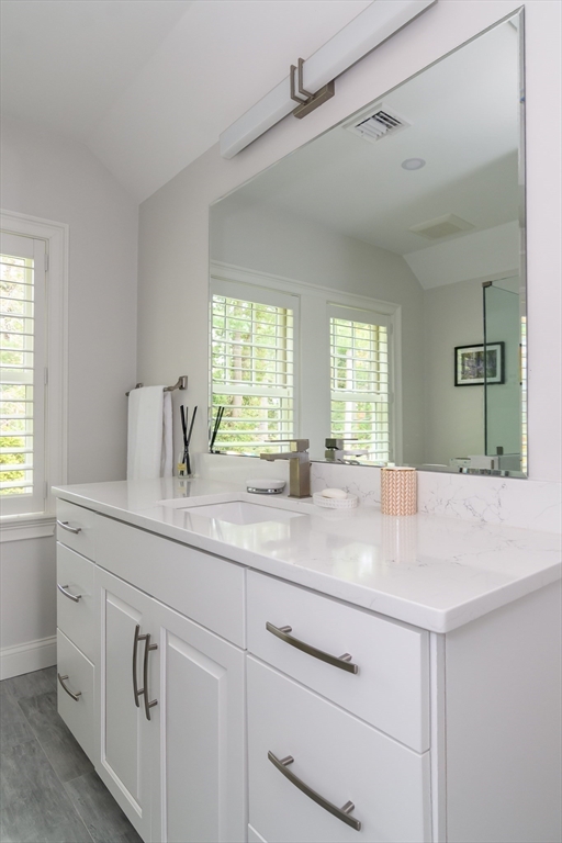 1098 Webster Street Needham, MA 02492 - Photo 13 of 21 a kitchen with white cabinets and sink