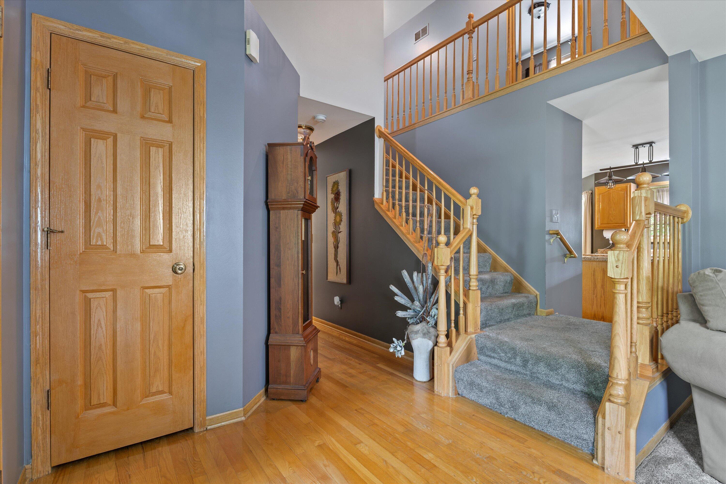 3330 Wood Road Mount Pleasant, WI 53406 - Photo 20 of 46 Front Foyer w/ double staircase