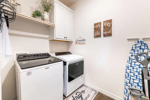 a stove top oven sitting inside of a kitchen
