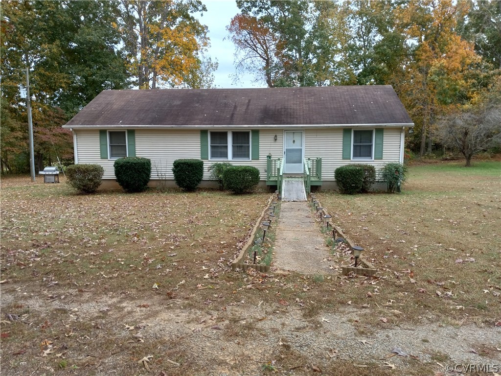 2964 West Creek Road Crewe, VA 23930 - Photo 1 of 46 a view of a house with a yard and a large tree