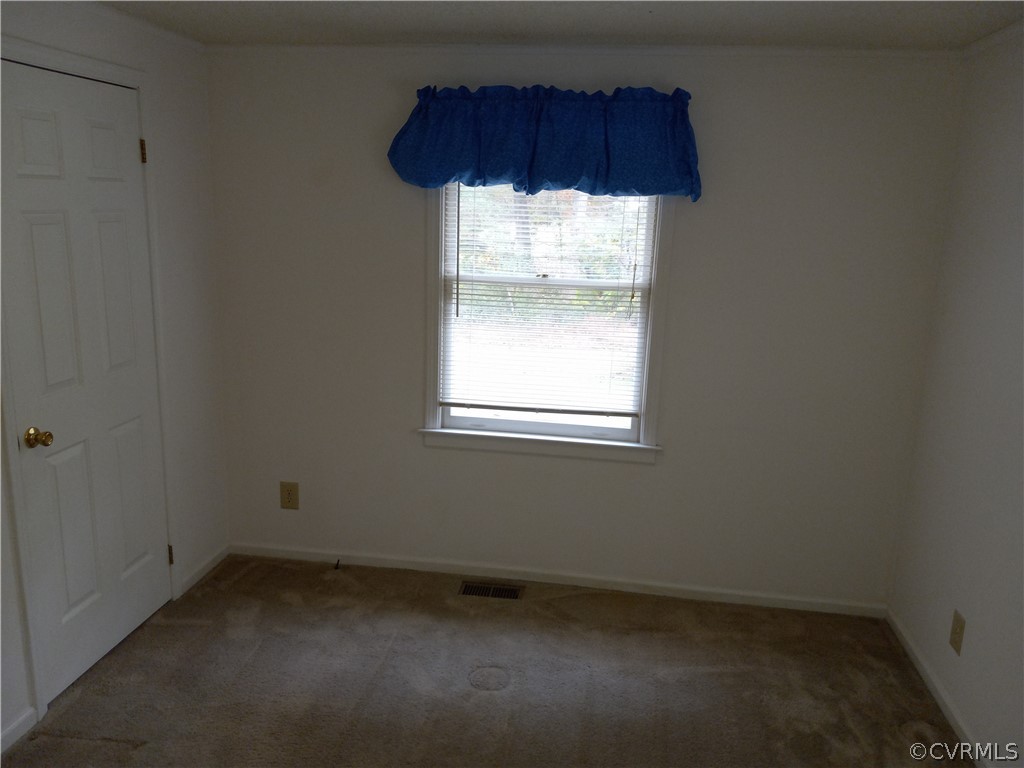 2964 West Creek Road Crewe, VA 23930 - Photo 19 of 46 an empty room with a window