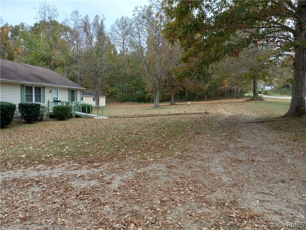 2964 West Creek Road Crewe, VA 23930 - Photo 31 of 46 a view of a yard with plants and trees