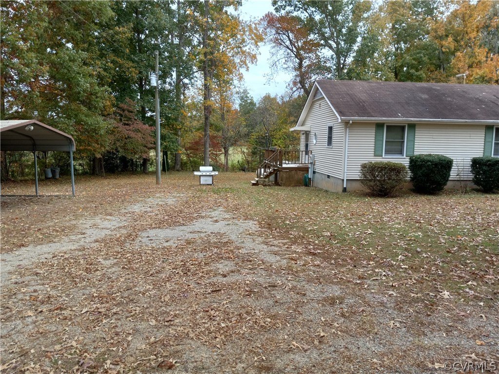 2964 West Creek Road Crewe, VA 23930 - Photo 32 of 46 a view of a house with a yard siting and a tree