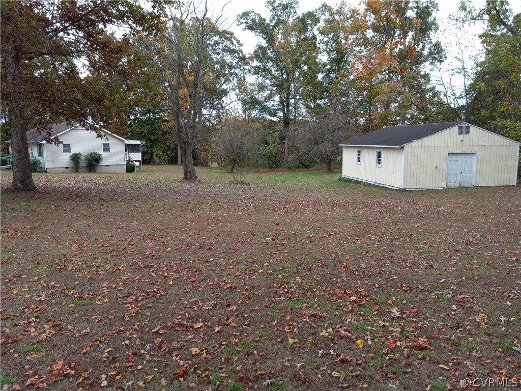 2964 West Creek Road Crewe, VA 23930 - Photo 39 of 46 a view of a house with a tree and a yard