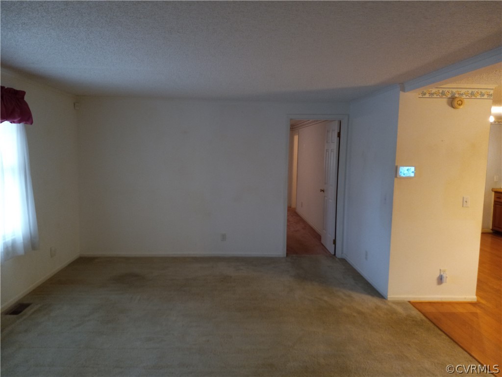 2964 West Creek Road Crewe, VA 23930 - Photo 4 of 46 an empty room with a window