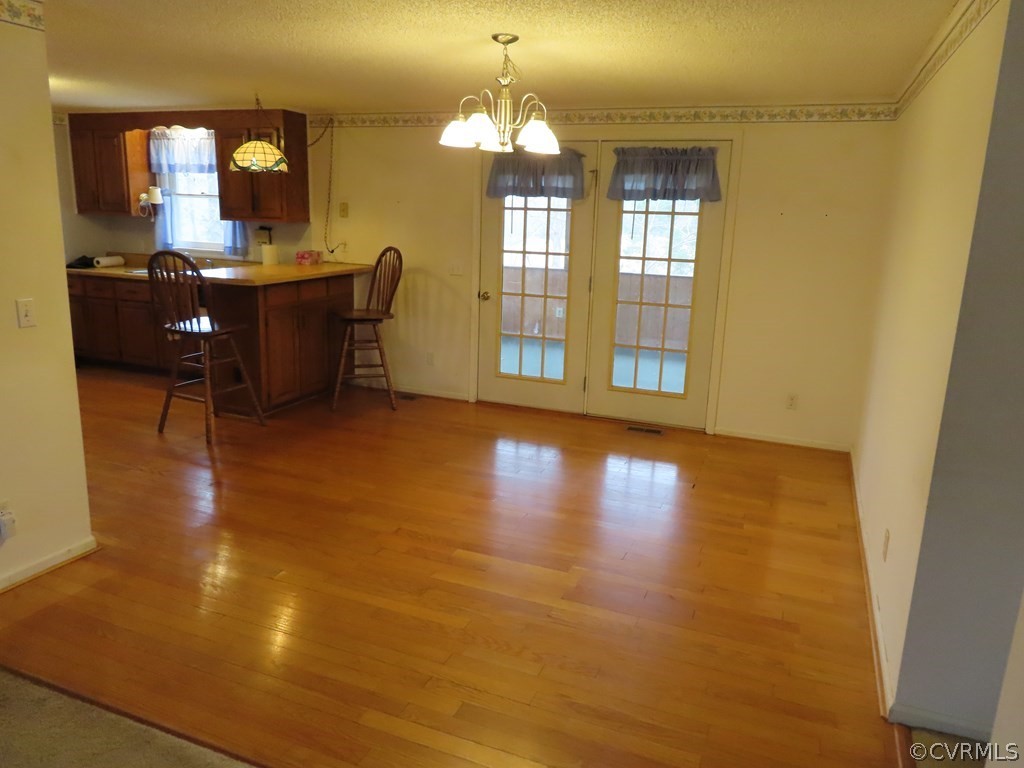 2964 West Creek Road Crewe, VA 23930 - Photo 6 of 46 a view of a livingroom with furniture window and wooden floor