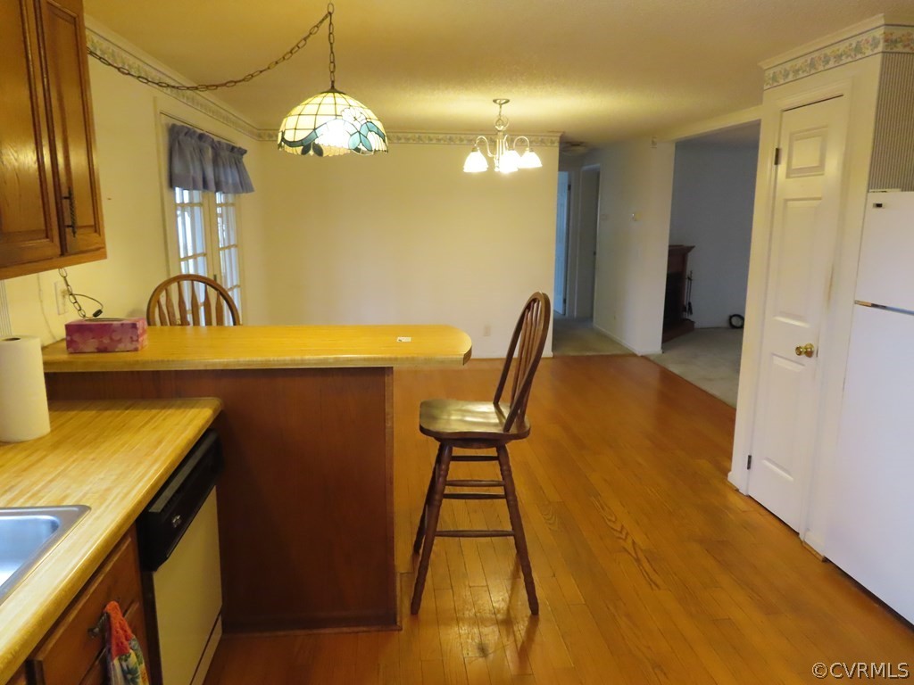 2964 West Creek Road Crewe, VA 23930 - Photo 10 of 46 a view of a dining room with furniture and chandelier