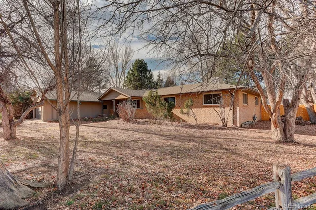 a view of a house with a big yard